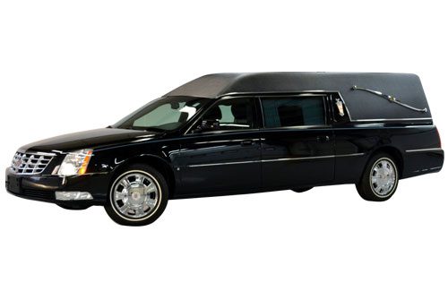 A sleek black hearse with tinted windows and chrome wheels.