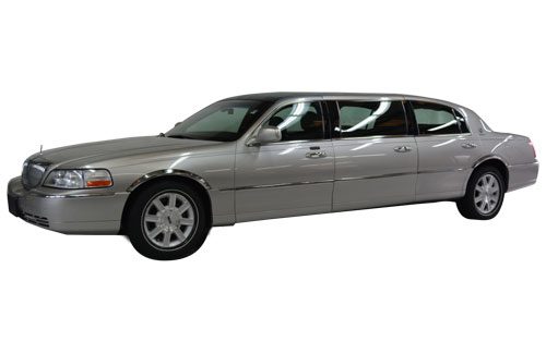 A sleek silver limousine with tinted windows.