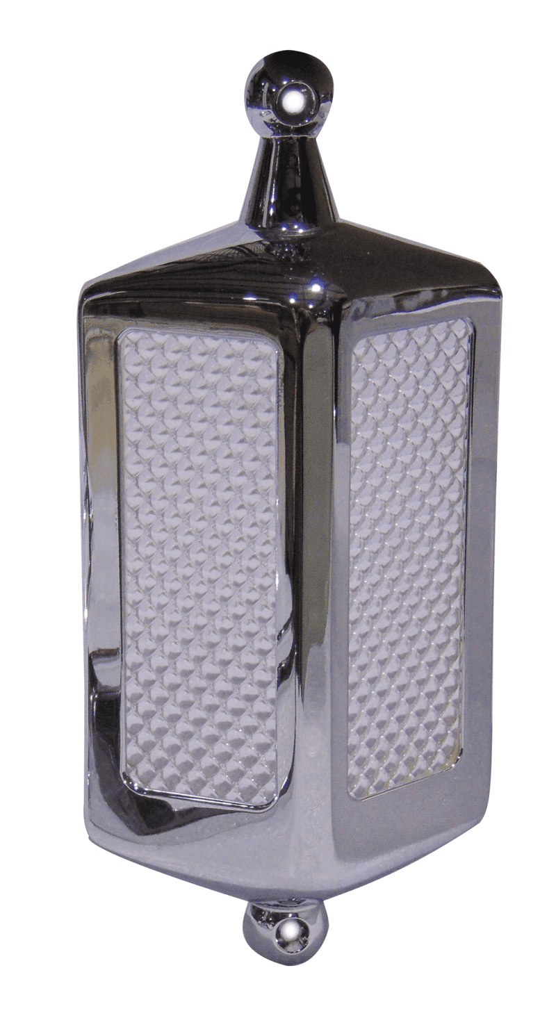 Chrome vintage car hood ornament with texture.