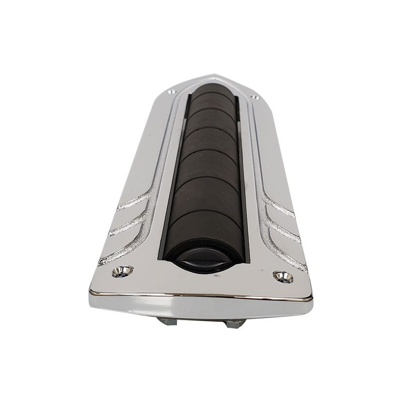 A metallic and black cylindrical device with screws on the sides.