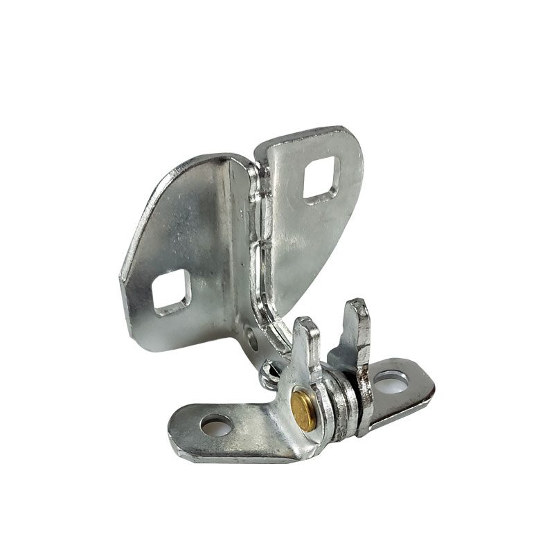Close-up of a metal hinge with mounting holes and a pivot mechanism.