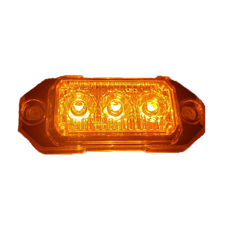 Amber LED marker light with three LEDs for vehicles.