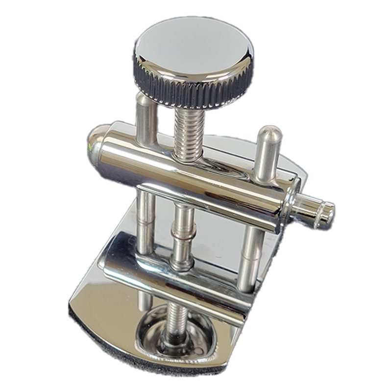 Shiny metal clamp with screw adjustment on a white background.