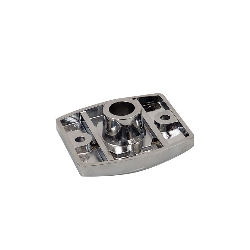 Silver metal mechanical part with multiple holes and a central cylindrical feature.
