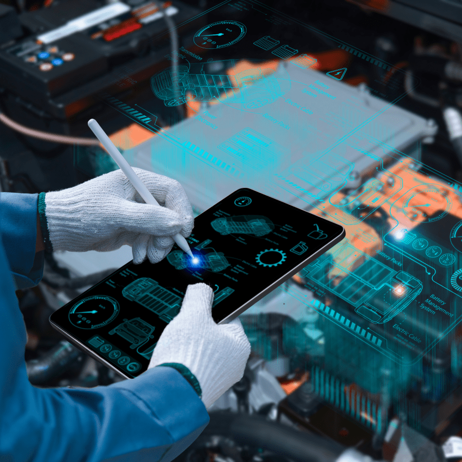 Technician using a tablet to diagnose car engine issues.