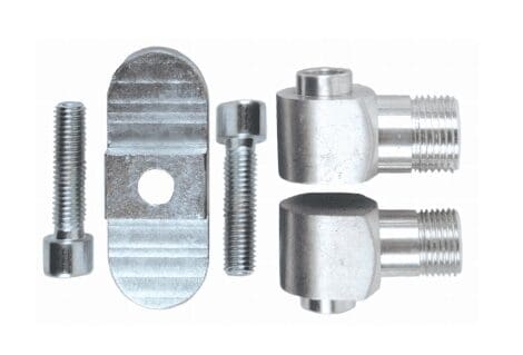 Metal screws and fittings arranged on a white background.