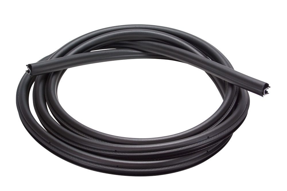 Coiled black rubber weatherstripping seal for doors or windows.