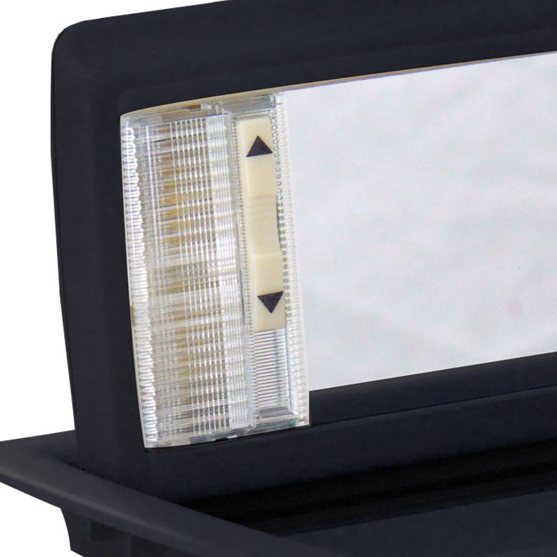 Close-up of a window blind control with up and down arrows.