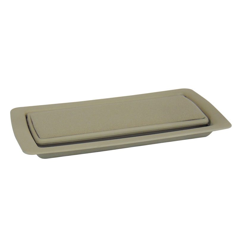 A beige rectangular plastic lid with a recessed top.