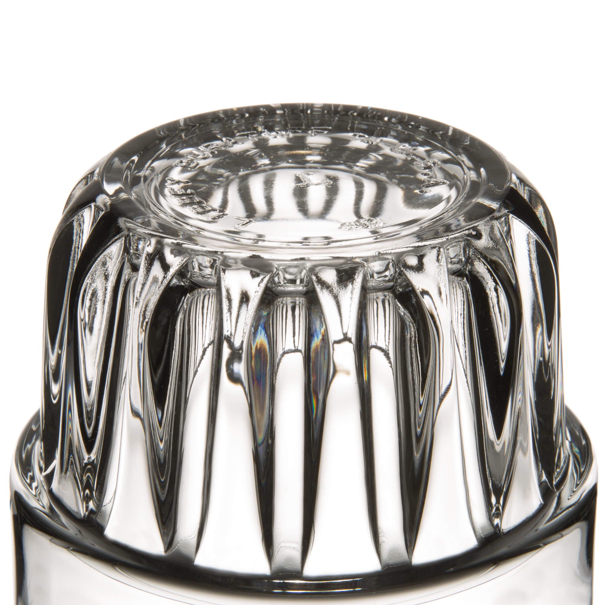 Close-up of a clear plastic faucet handle with ridged grip.