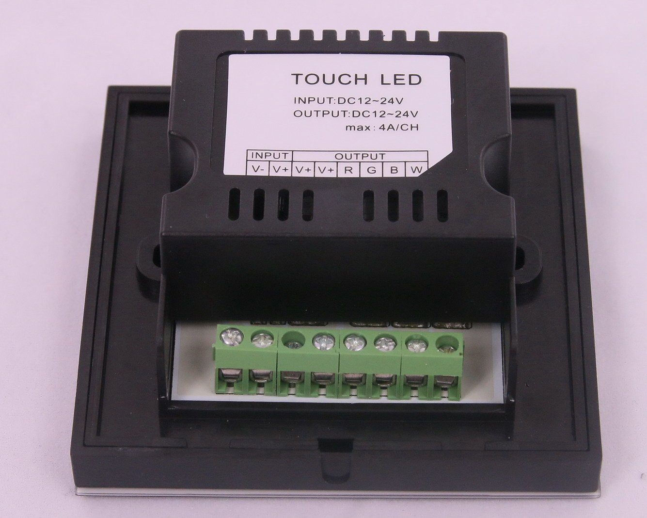Touch LED control panel with wiring terminals.