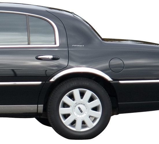 Side view of a black luxury sedan focusing on the rear wheel and door.